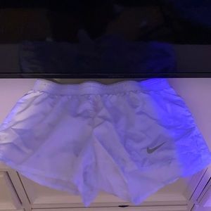 white nike shorts